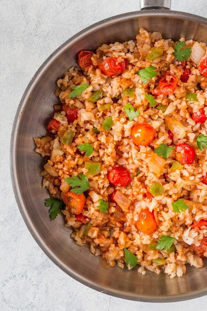 Low Carb Cauliflower Mexican Rice, also known as Spanish Cauliflower Rice, easy paleo, low carb, whole30 side dish recipe you’ll love! | www.noshtastic.com | #lowcarb #keto #paleo #cauliflowerrice #mexicanrice #spanishrice #whole30 #w30 #glutenfree #noshtastic #glutenfreerecipe