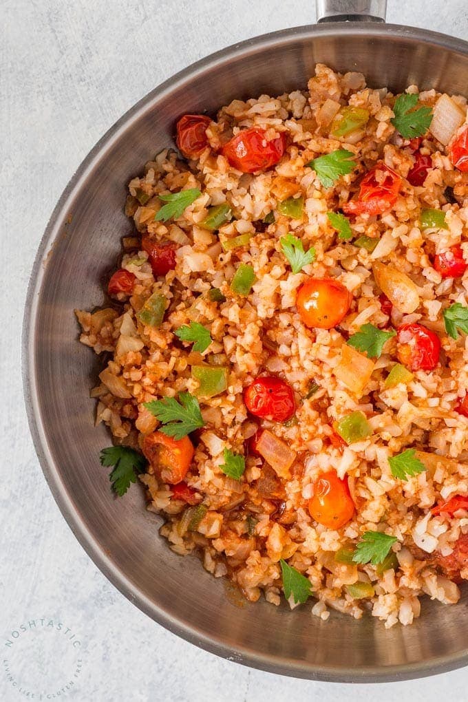 Low Carb Cauliflower Mexican Rice, also known as Spanish Cauliflower Rice, easy paleo, low carb, whole30 side dish recipe you’ll love! | www.noshtastic.com | #lowcarb #keto #paleo #cauliflowerrice #mexicanrice #spanishrice #whole30 #w30 #glutenfree #noshtastic #glutenfreerecipe 