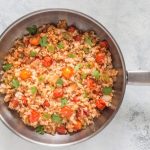 Cauliflower Mexican Rice, a low carb spin on a classic recipe, also known as Spanish Cauliflower Rice, easy paleo, low carb, whole30 side dish recipe you’ll love! | www.noshtastic.com | #lowcarb #keto #paleo #cauliflowerrice #mexicanrice #spanishrice #whole30 #w30 #glutenfree #noshtastic #glutenfreerecipe
