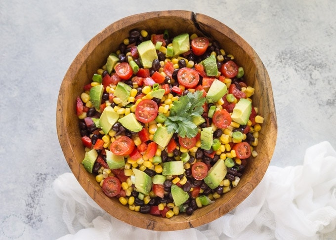 black bean corn avocado salad in a bowl