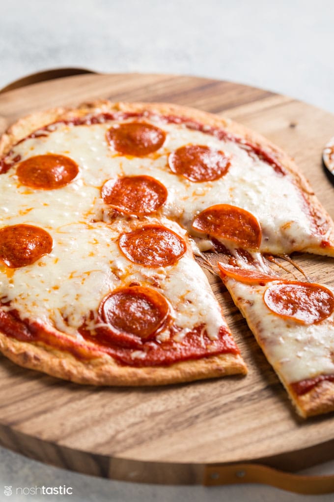 Fathead pizza with a slice cut out