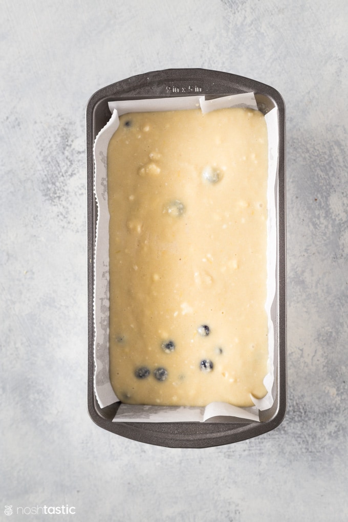 Ingredients for low carb blueberry cake in a loaf pan 