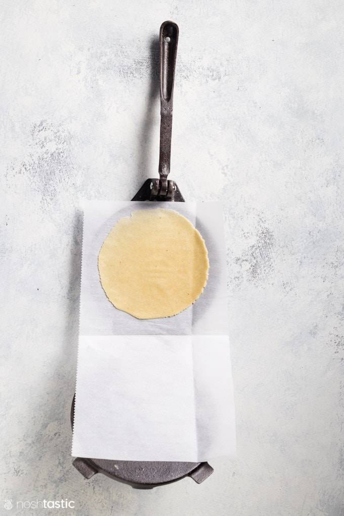 tortillas in a tortilla press