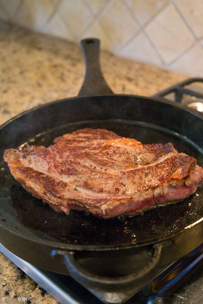 Pot Roast browning in a cast iron skillet