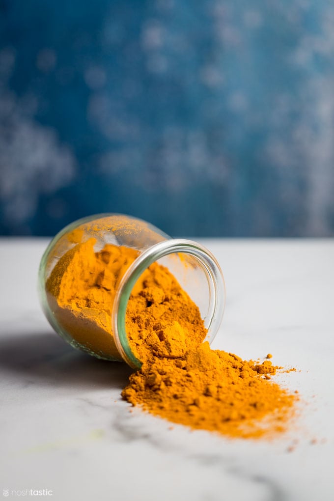 ground turmeric in a jar