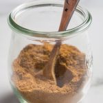 Ras El Hanout spices in a small glass jar
