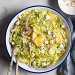 Shaved brussels sprout salad recipe in a bowl