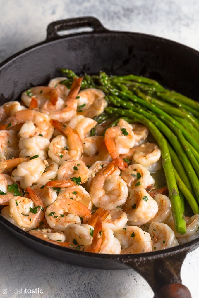 garlic butter shrimp in a skillet