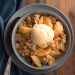Gluten Free Apple Crisp in a bowl with scoop of ice cream