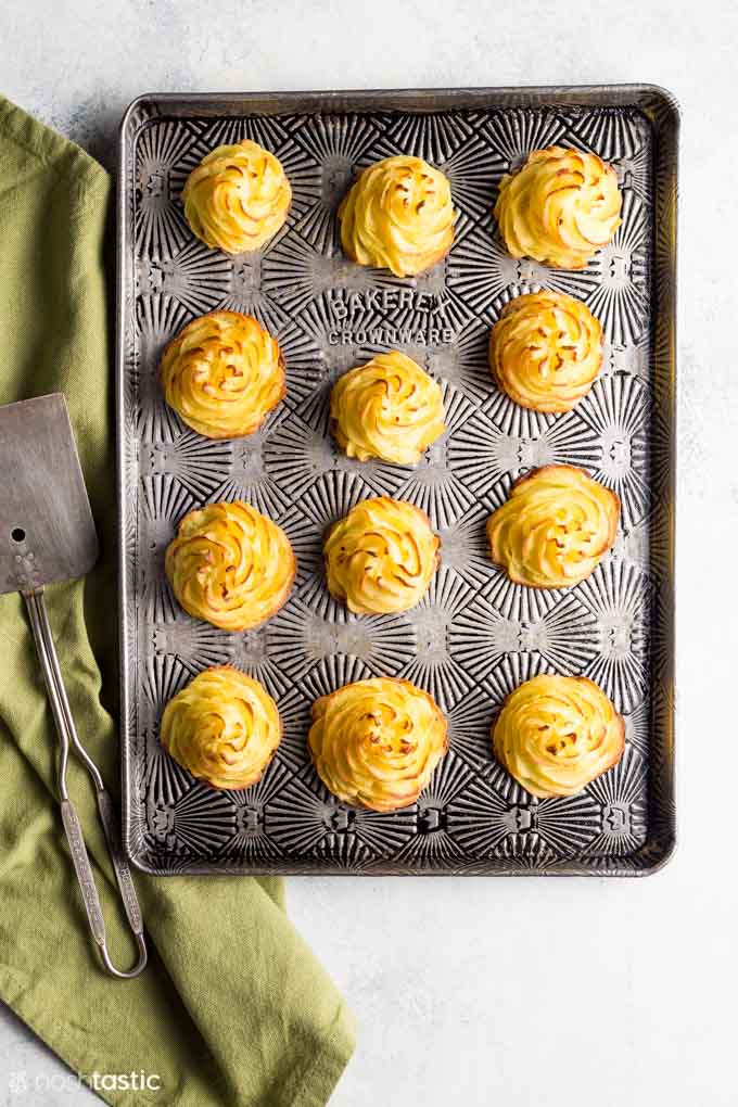 Duchess potatoes on a baking sheet