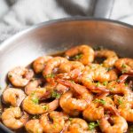 Honey garlic shrimp with sauce in a skillet