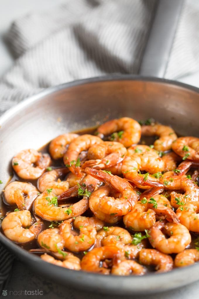 Honey garlic shrimp with sauce in a skillet