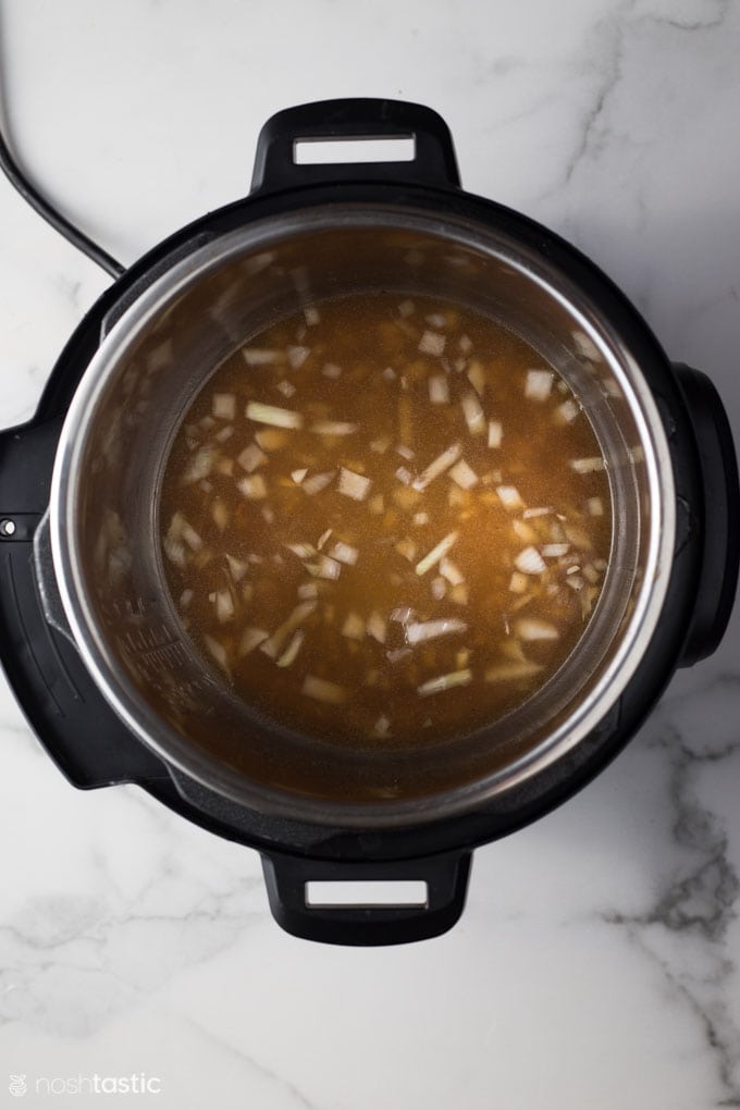 Vegetables and broth in an instant pot