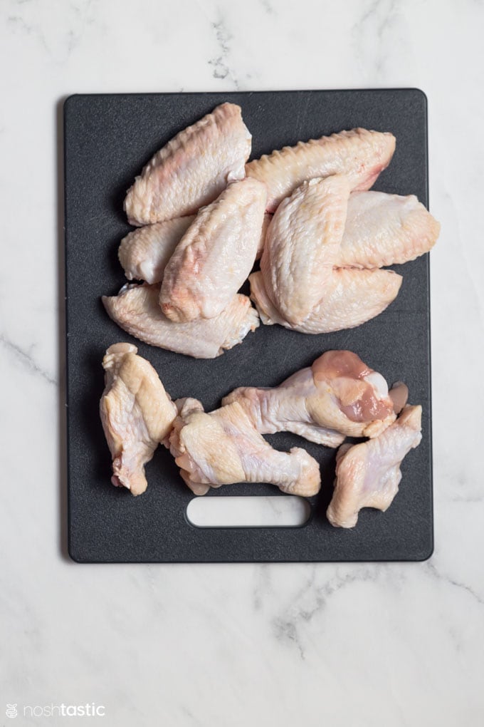 chicken wings on a board