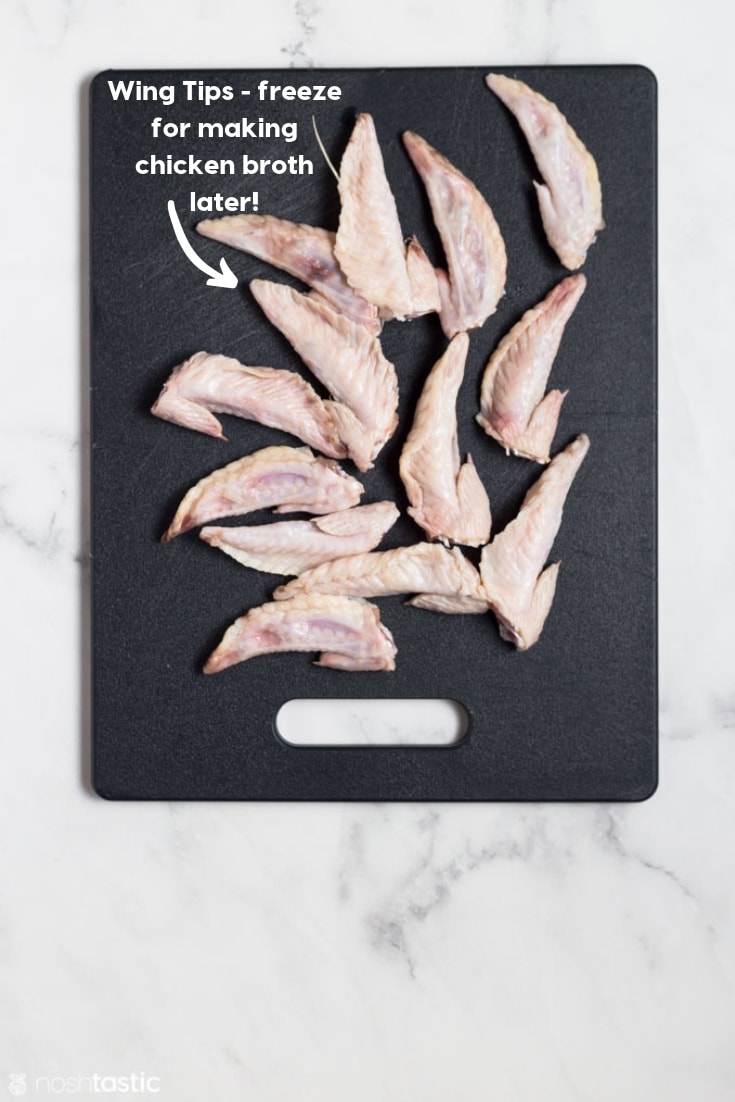 Chicken wing tips on a cutting board