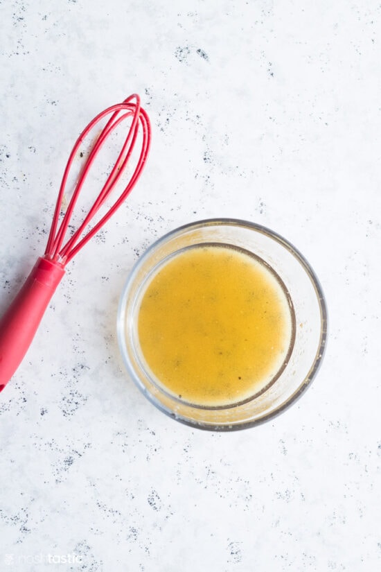 homemade salad dressing with whisk