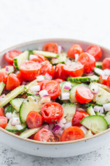 cucumber tomato salad in bowl