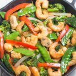 shrimp stir fry in cast iron skillet