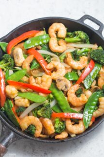 shrimp stir fry in cast iron skillet