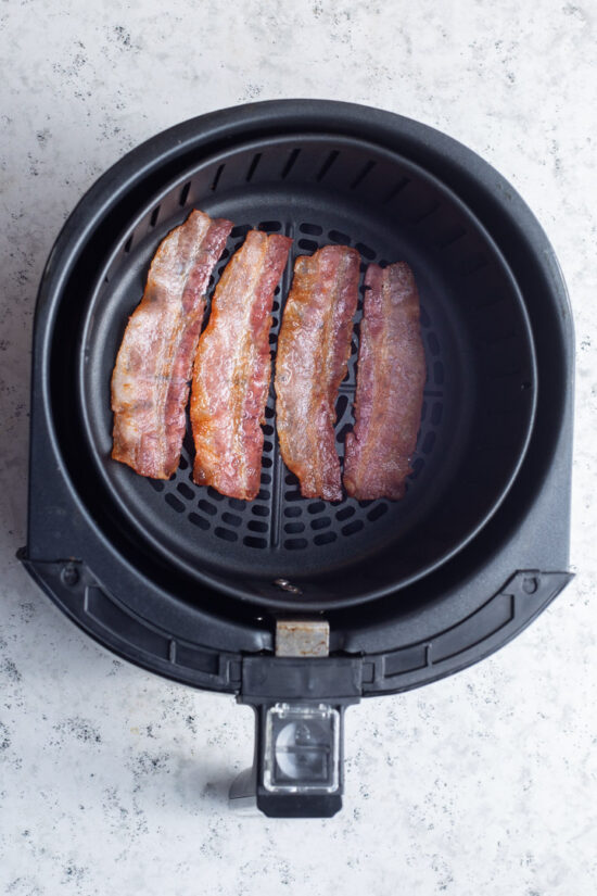 cooked bacon in air fryer basket