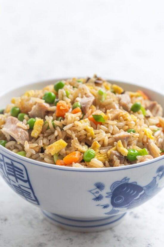 Egg fried rice in blue and white bowl