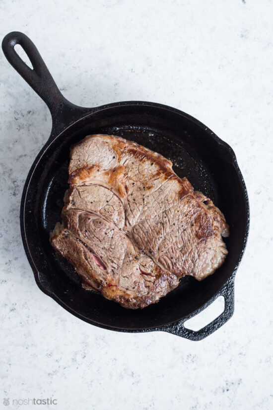 chuck roast in a cast iron skillet