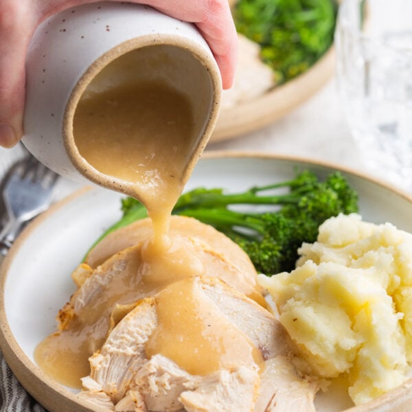 chicken and mashed potatoes with gravy poured over