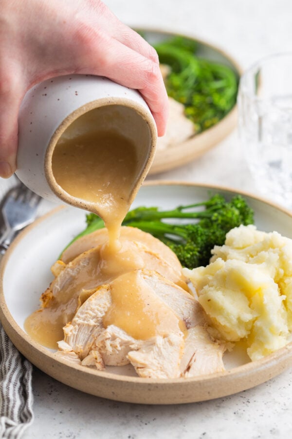 chicken and mashed potatoes with gravy poured over