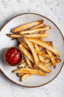 French Fries on a plate with ketchup