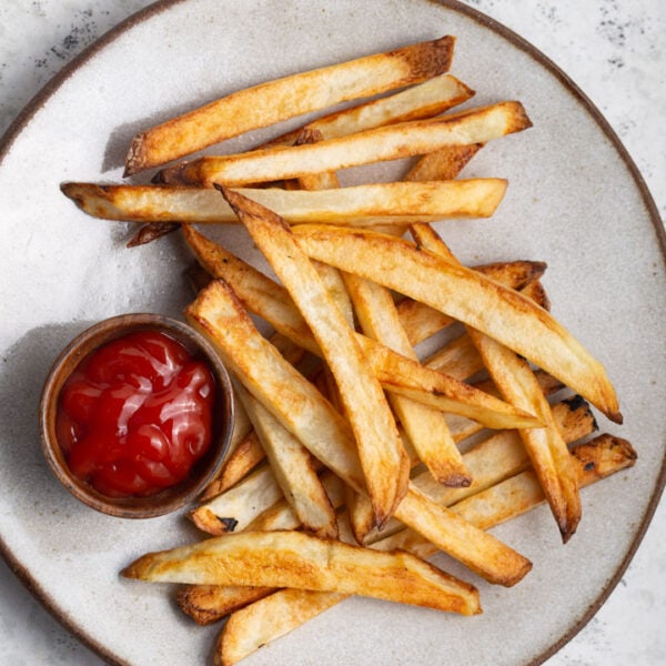 French Fries on a plate with ketchup