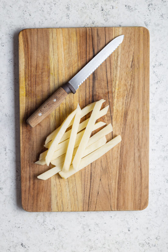 hand cut fries on a board