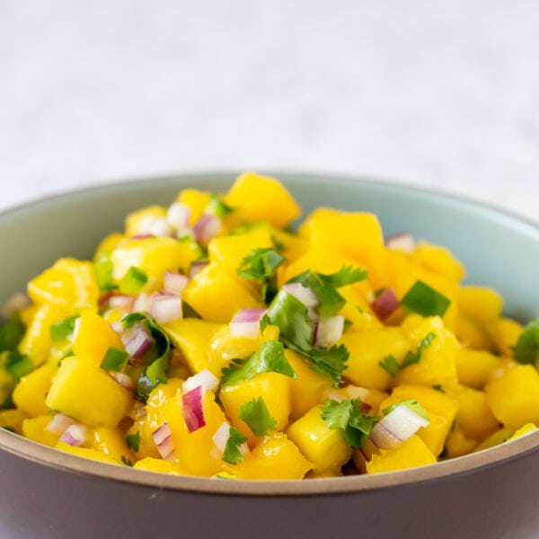 mango salsa in a brown bowl