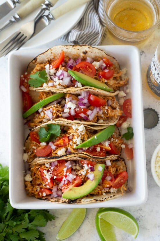 chicken tacos in a white bowl