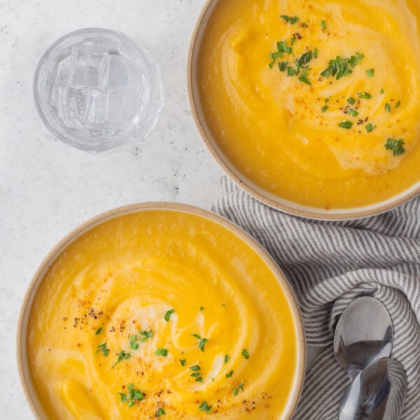 two bowls of butternut soup