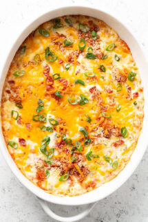 overhead view of jalapeno popper dip in a white dish